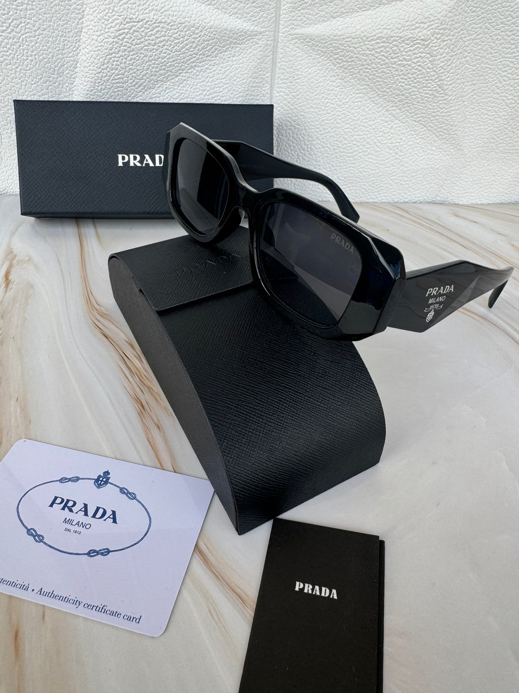 Lentes de sol Prada Diamante