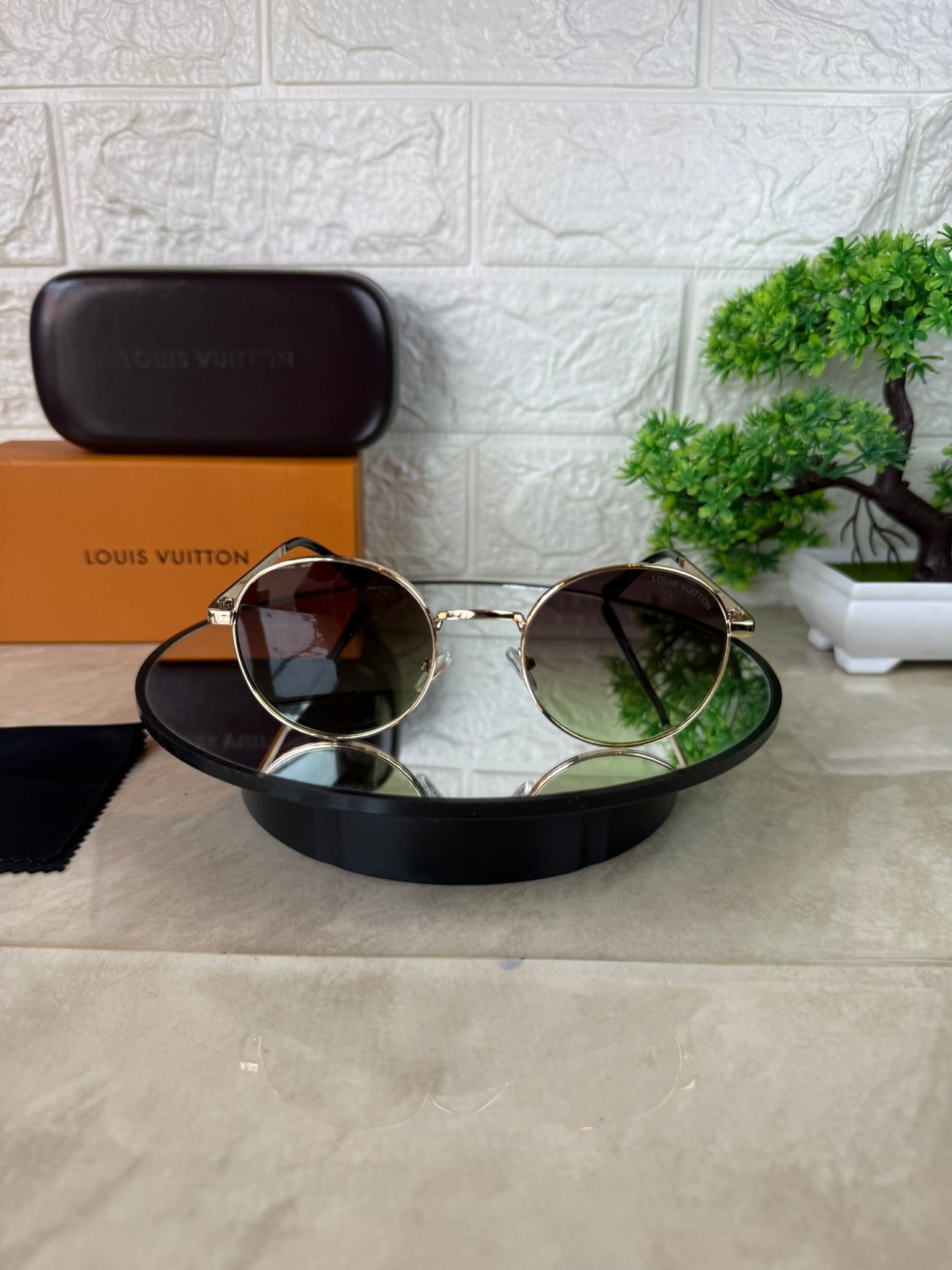 Lentes de sol LV Redondo