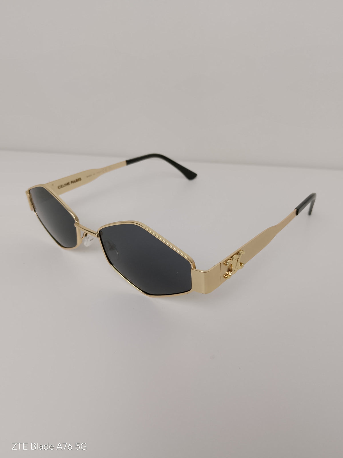 Celine Triangular
