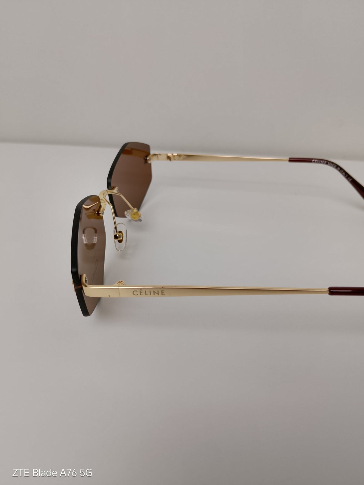 Celine Triangular